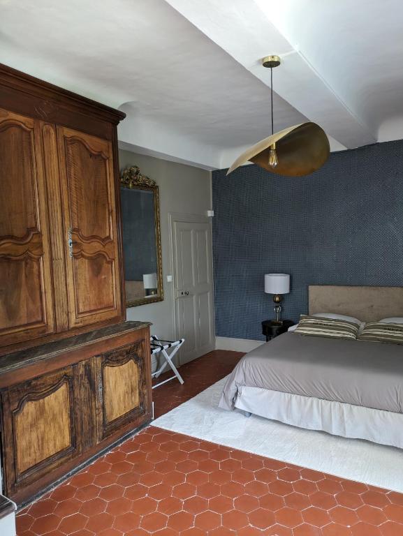 Postel nebo postele na pokoji v ubytování Le Domaine du Soulier -Gîte et chambres d'hôtes - La Maison du Gardien