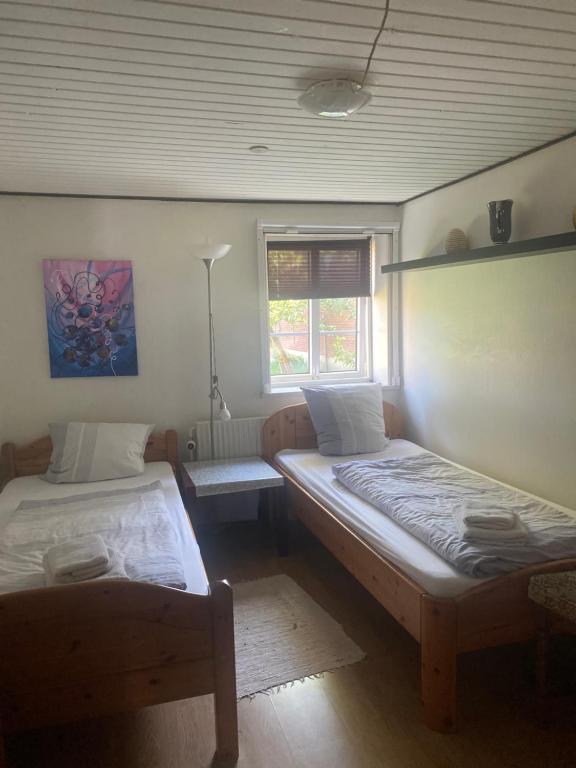 Postel nebo postele na pokoji v ubytování Ferienzimmervermietung Reitferien