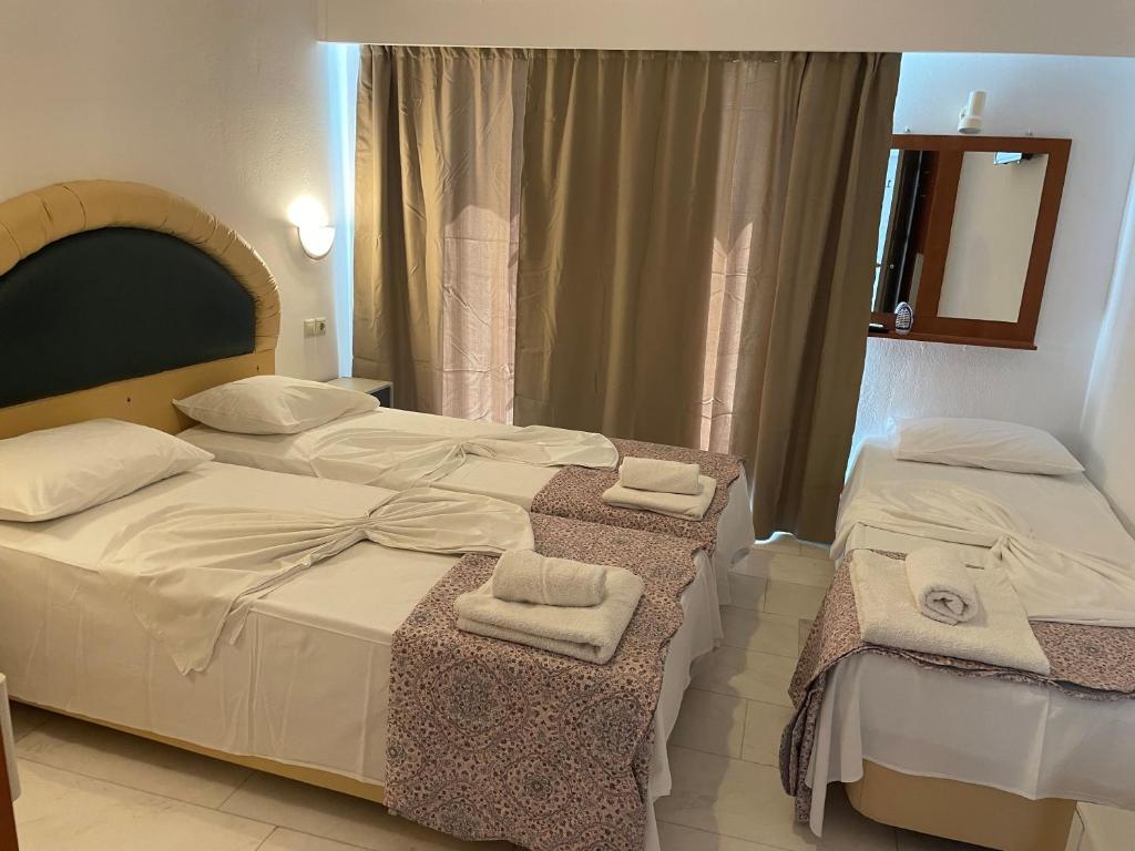 Hotel Kourkoumelata - Chambre Triple Économique