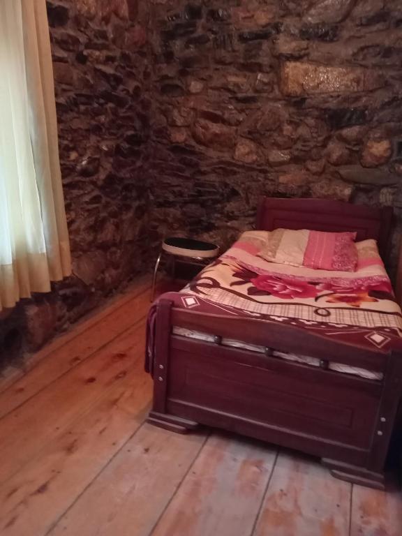 Postel nebo postele na pokoji v ubytování Stone House marexi