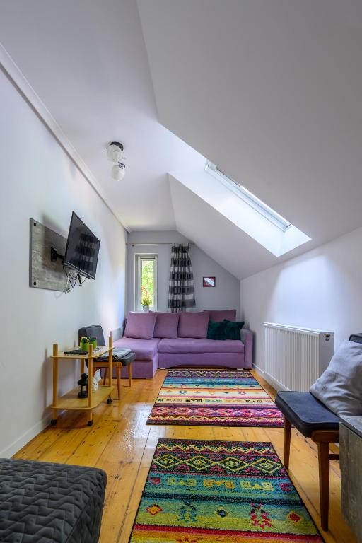 TV a/nebo společenská místnost v ubytování Apartamenty na Piątkę