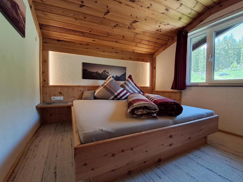 Postel nebo postele na pokoji v ubytování Bergchalet Kaunergrat