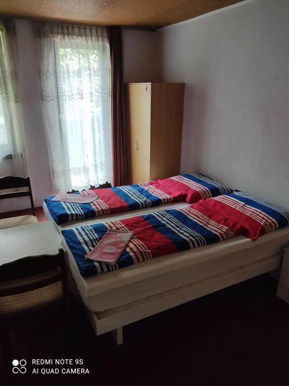 Postel nebo postele na pokoji v ubytování Sobe GRAJSKA