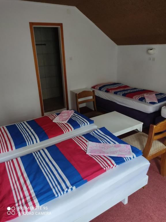 Postel nebo postele na pokoji v ubytování Sobe GRAJSKA