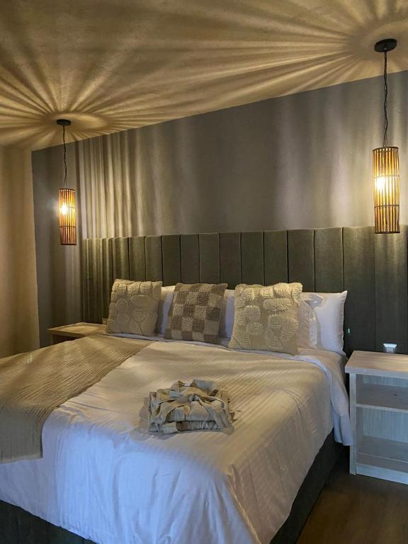 Postel nebo postele na pokoji v ubytování Altamonte Hotel Boutique