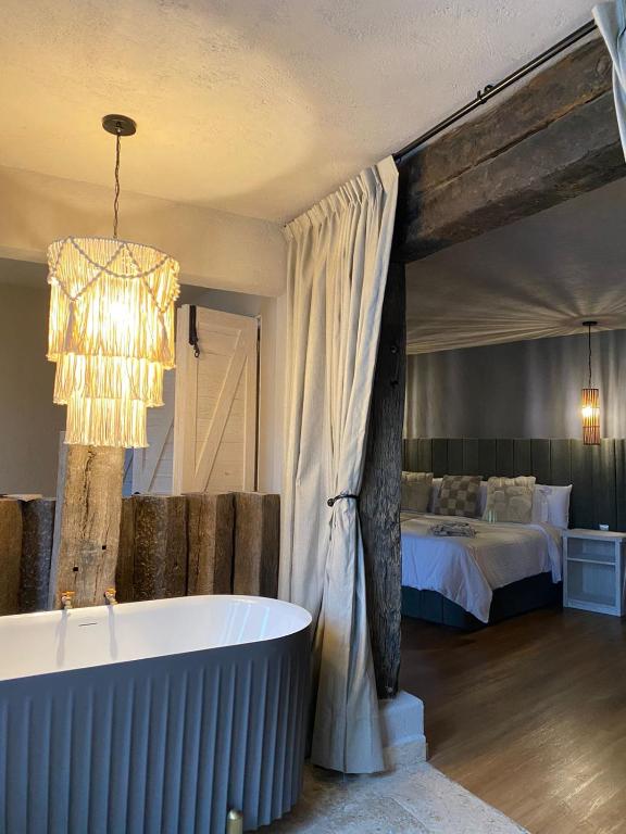 Postel nebo postele na pokoji v ubytování Altamonte Hotel Boutique