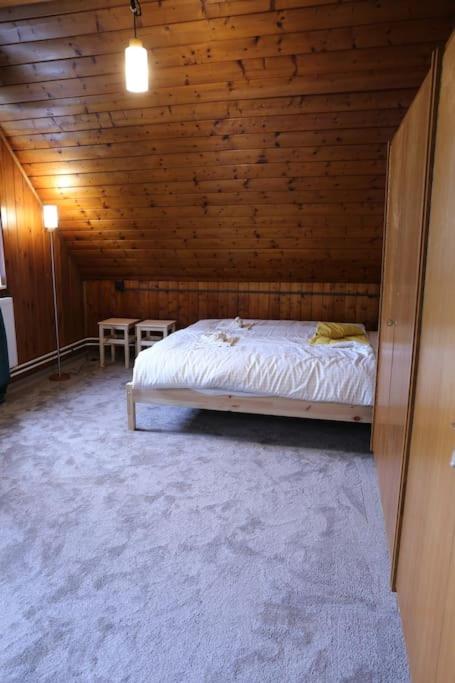Postel nebo postele na pokoji v ubytování Chata Na Cvičence