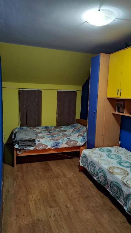Postel nebo postele na pokoji v ubytování Zizi i Zen