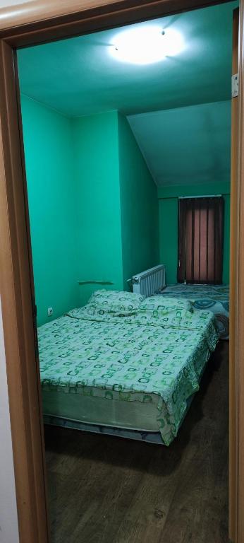 Postel nebo postele na pokoji v ubytování Zizi i Zen