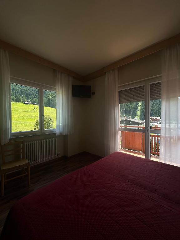 Postel nebo postele na pokoji v ubytování Hotel Continental