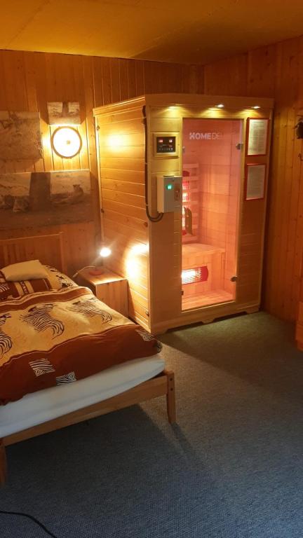 Postel nebo postele na pokoji v ubytování Haus Tsavo