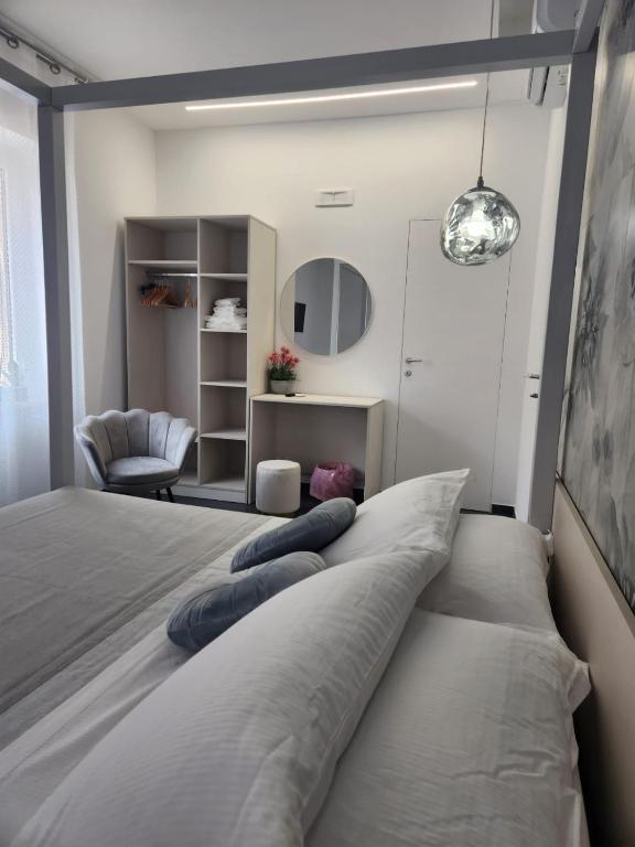 Postel nebo postele na pokoji v ubytování B&B Central Vasto