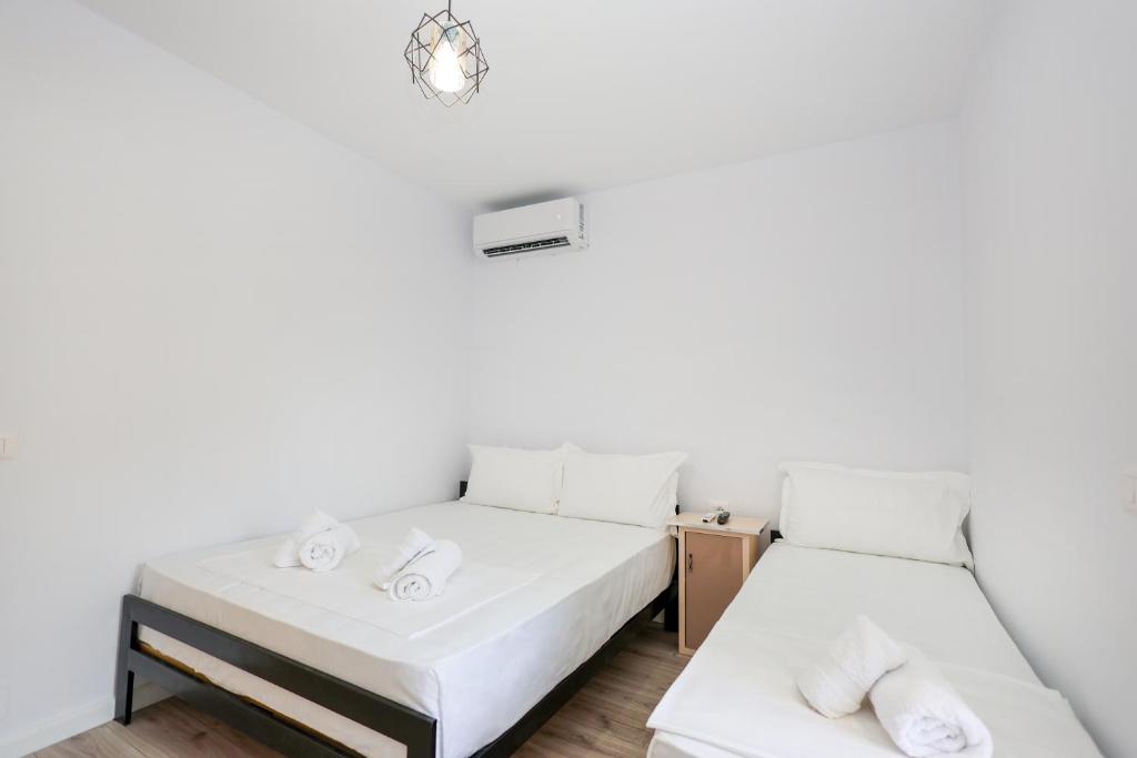 Voodi või voodid majutusasutuse Guesthouse Noke toas