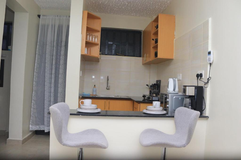 Kuchyň nebo kuchyňský kout v ubytování Naanyu Homestays