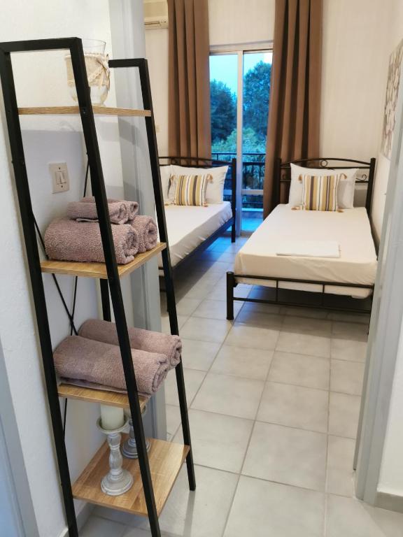 Postel nebo postele na pokoji v ubytování Villa Adamidis