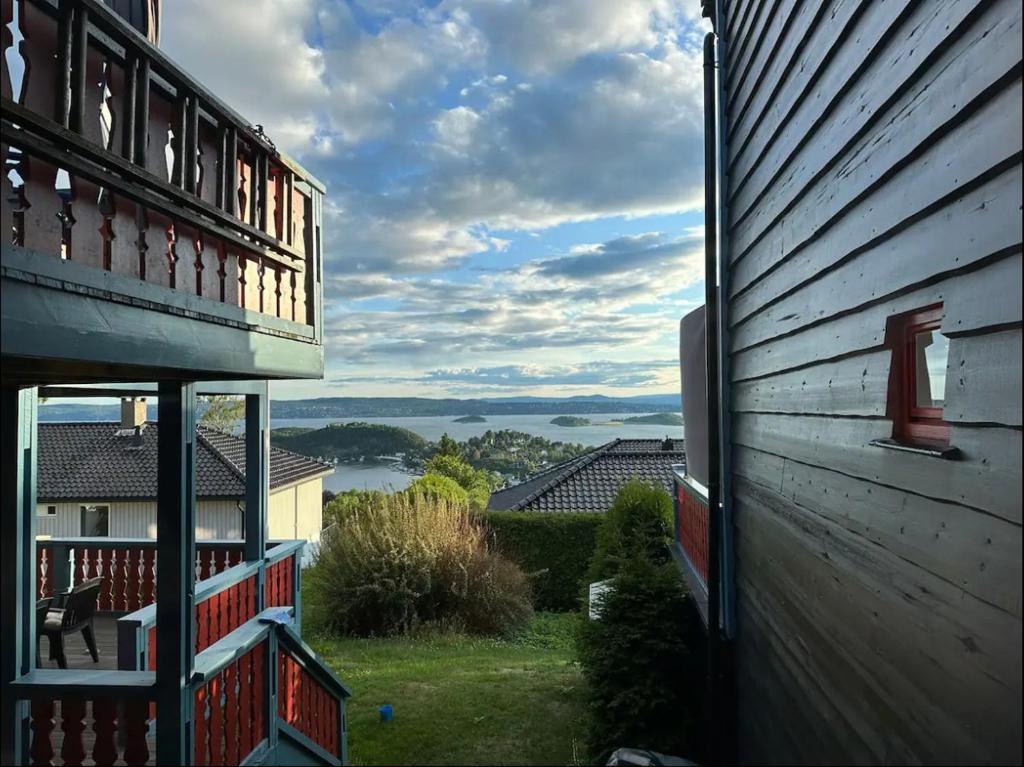 a view from a window of a house with a view at The View Guesthouse at Ekeberg -10 min by tram to Oslo S in Oslo