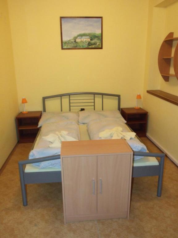Postel nebo postele na pokoji v ubytování Pension Skalka