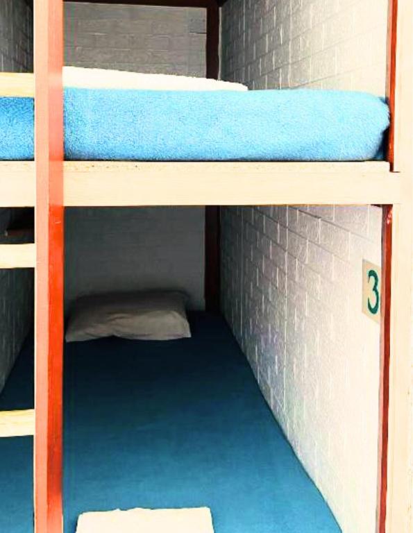 Postel nebo postele na pokoji v ubytování Arodes AsteriA Volunteer & Youth ECO-house