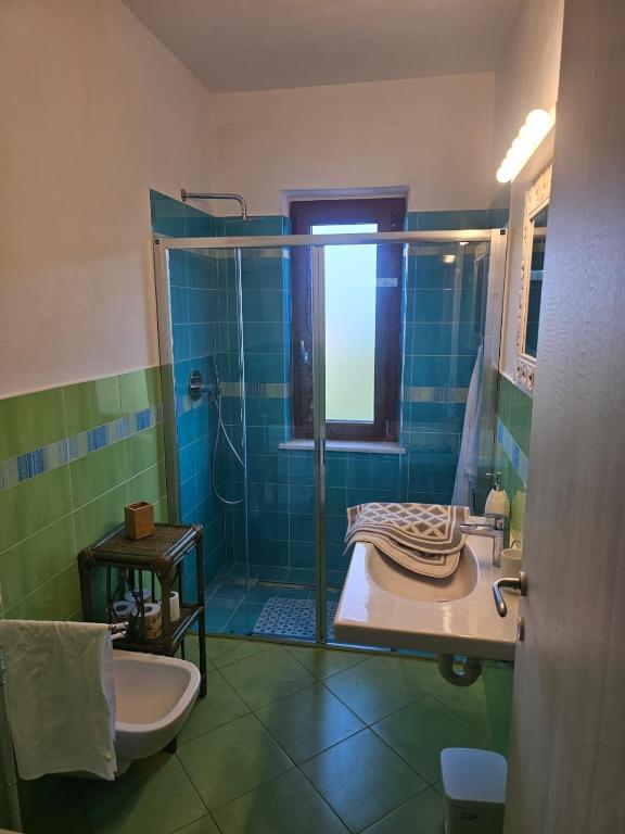 Koupelna v ubytování Appartamento Azzurro Mare