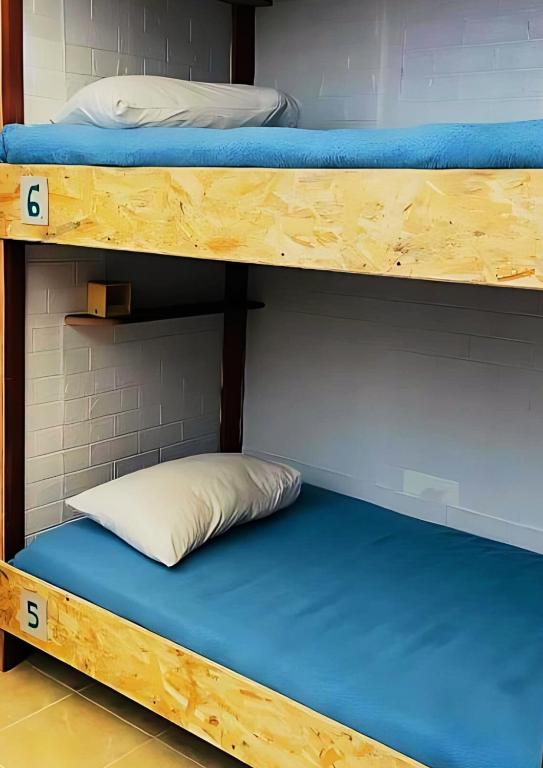 Postel nebo postele na pokoji v ubytování Arodes AsteriA Volunteer & Youth ECO-house