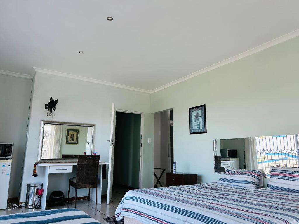 Postel nebo postele na pokoji v ubytování Cryfish Quarters