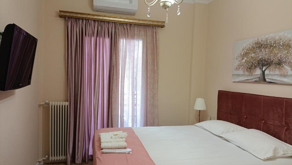 Postel nebo postele na pokoji v ubytování Coolio's home
