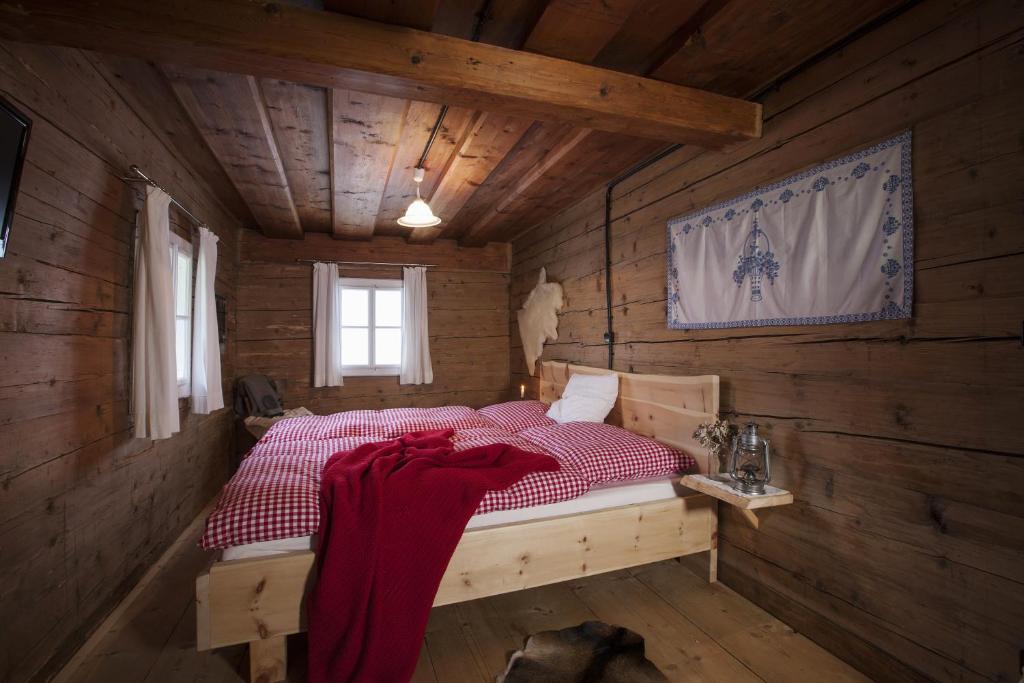 Postel nebo postele na pokoji v ubytování Schwadenguetl