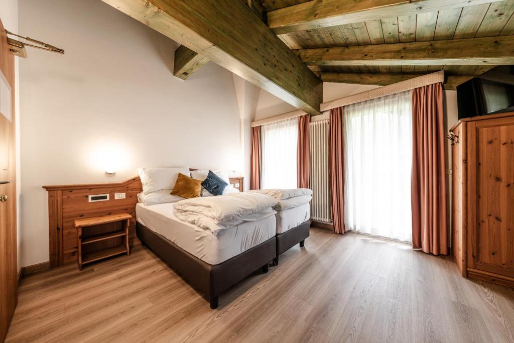Postel nebo postele na pokoji v ubytování Hotel La Noria