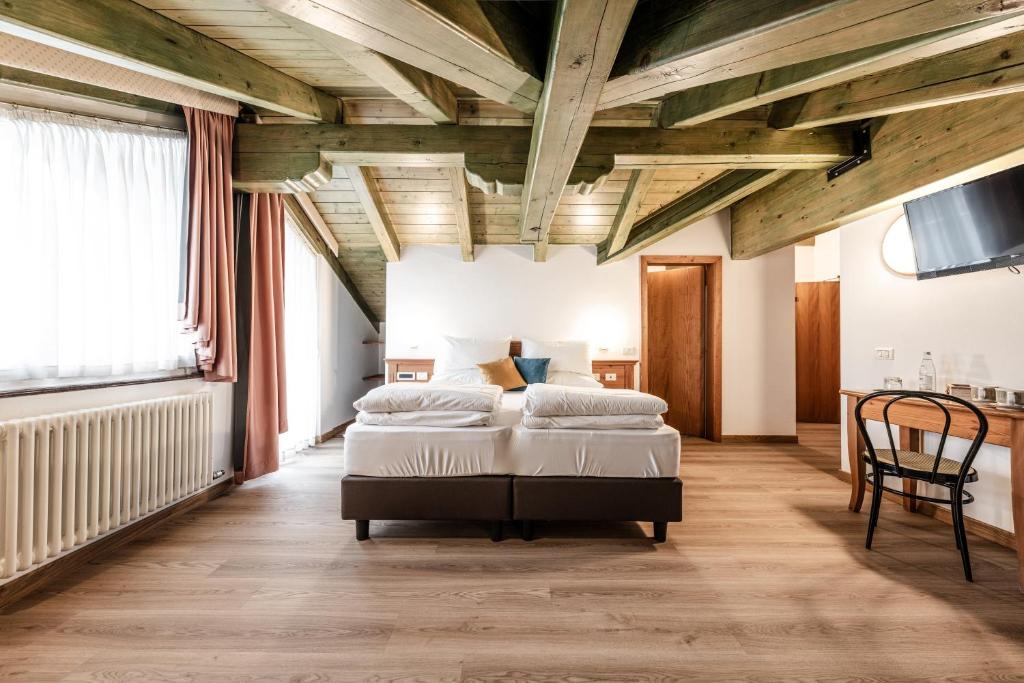 Postel nebo postele na pokoji v ubytování Hotel La Noria