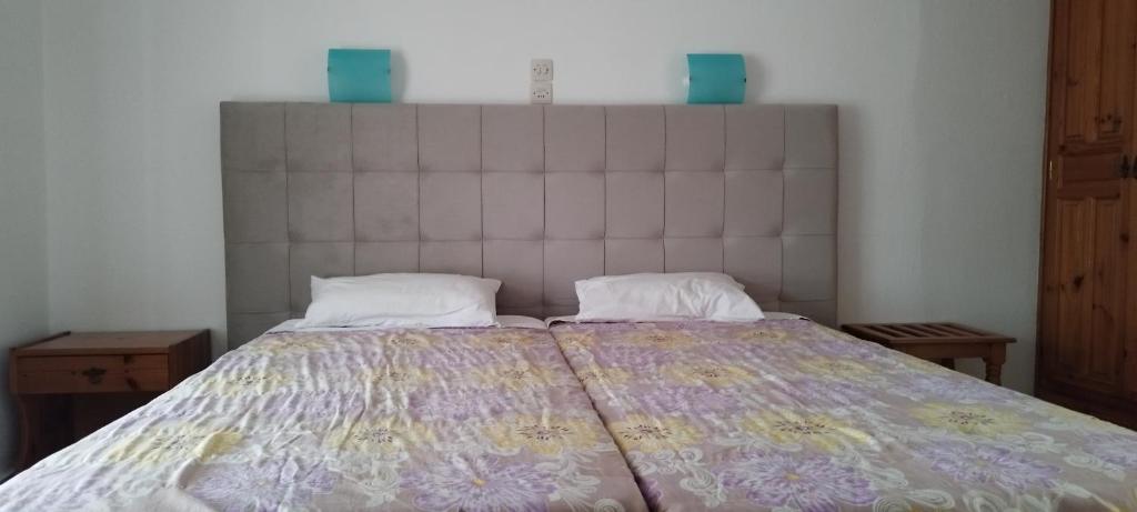 Postel nebo postele na pokoji v ubytování Kaiti Studios 1