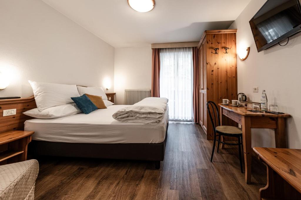 Postel nebo postele na pokoji v ubytování Hotel La Noria