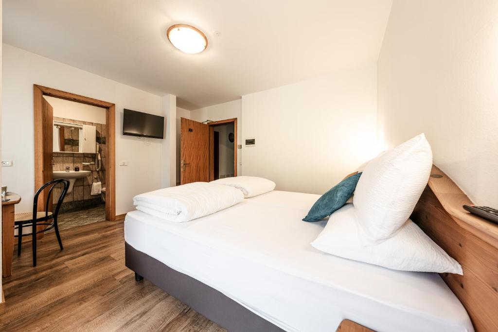 Postel nebo postele na pokoji v ubytování Hotel La Noria