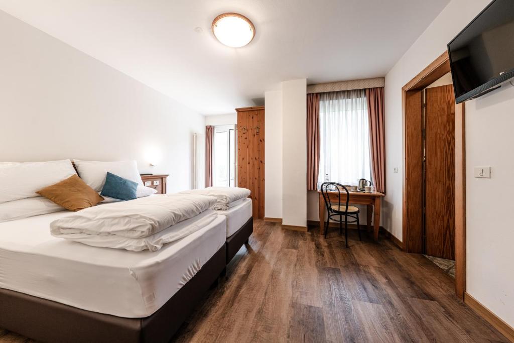 Postel nebo postele na pokoji v ubytování Hotel La Noria