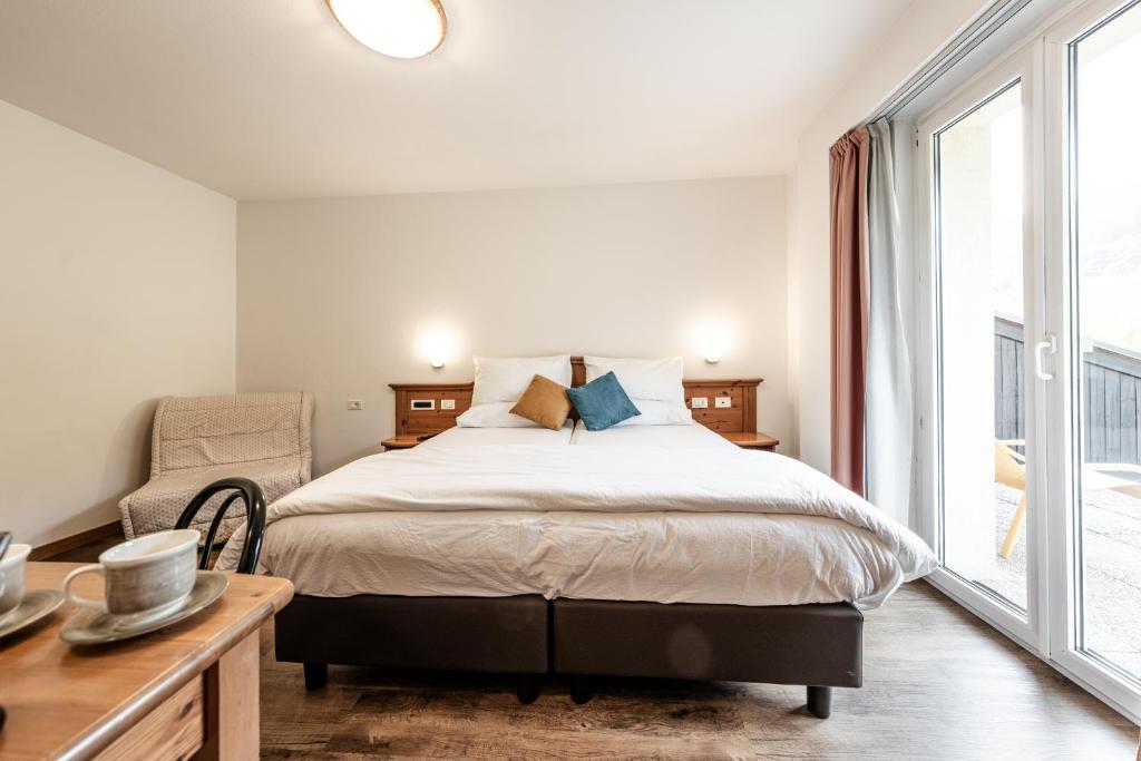 Postel nebo postele na pokoji v ubytování Hotel La Noria