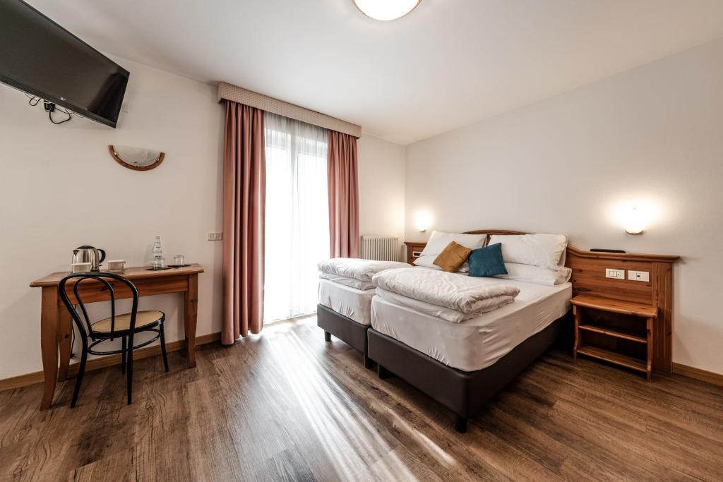Postel nebo postele na pokoji v ubytování Hotel La Noria