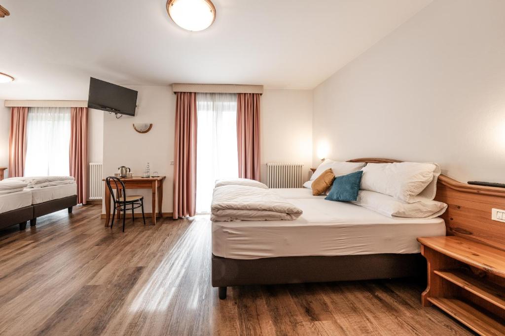 Postel nebo postele na pokoji v ubytování Hotel La Noria
