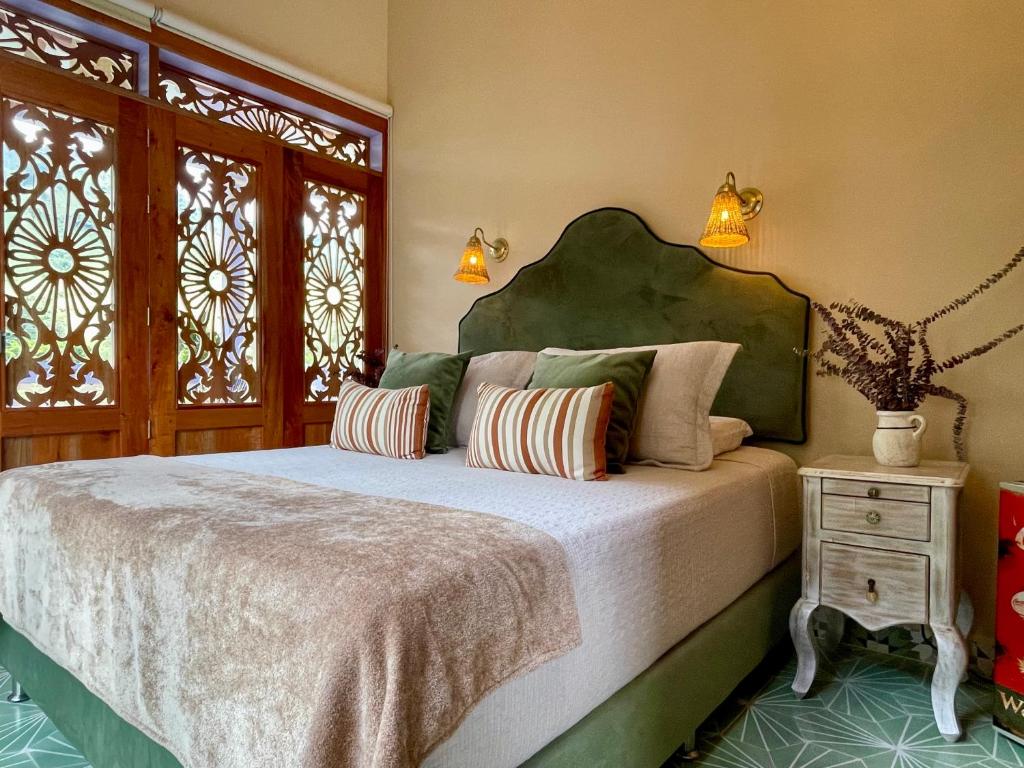 Postel nebo postele na pokoji v ubytování Hotel Lago Valdivia