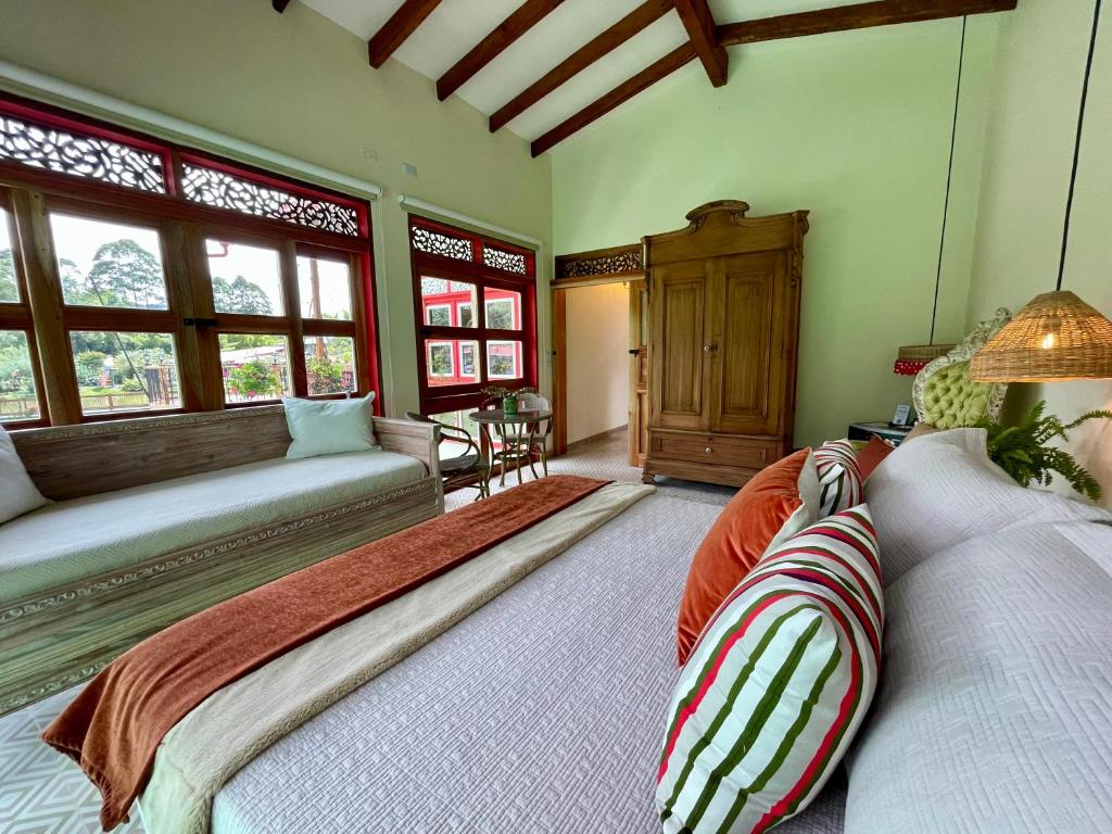 Postel nebo postele na pokoji v ubytování Hotel Lago Valdivia