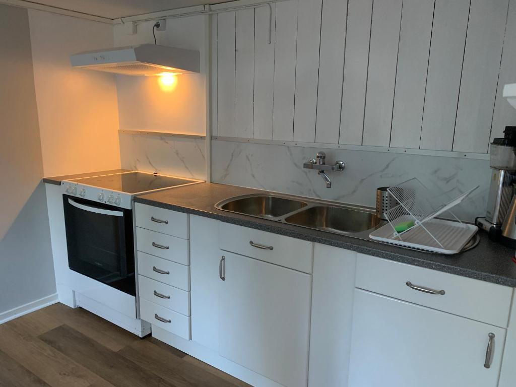 Kuchyň nebo kuchyňský kout v ubytování Karlshamn 1 Sankt Anna Söderköping