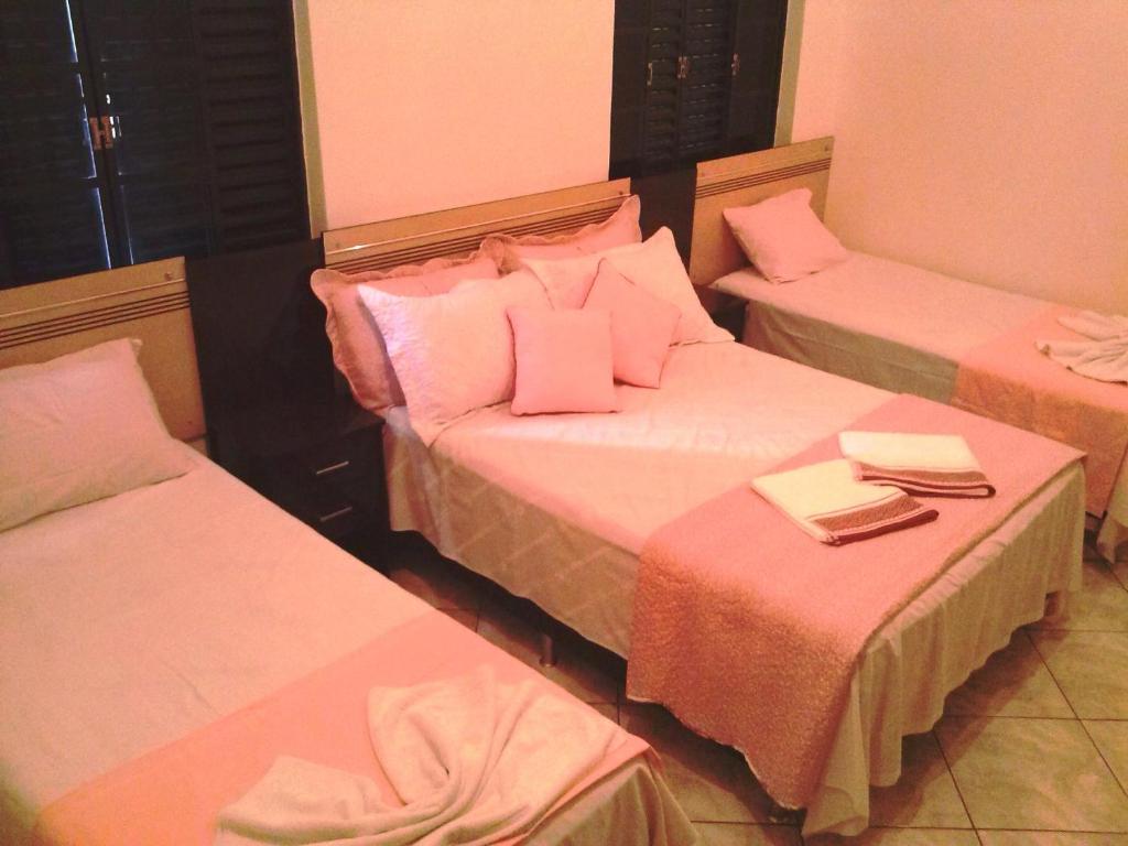 Postel nebo postele na pokoji v ubytování Hotel Royal Class