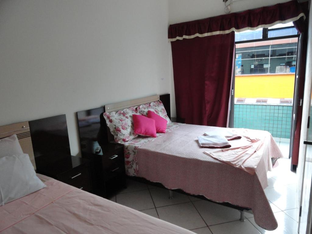 Postel nebo postele na pokoji v ubytování Hotel Royal Class
