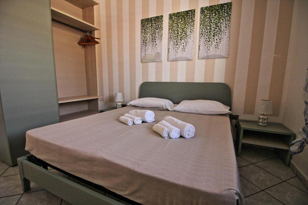 Postel nebo postele na pokoji v ubytování Residence Mare Azzurro