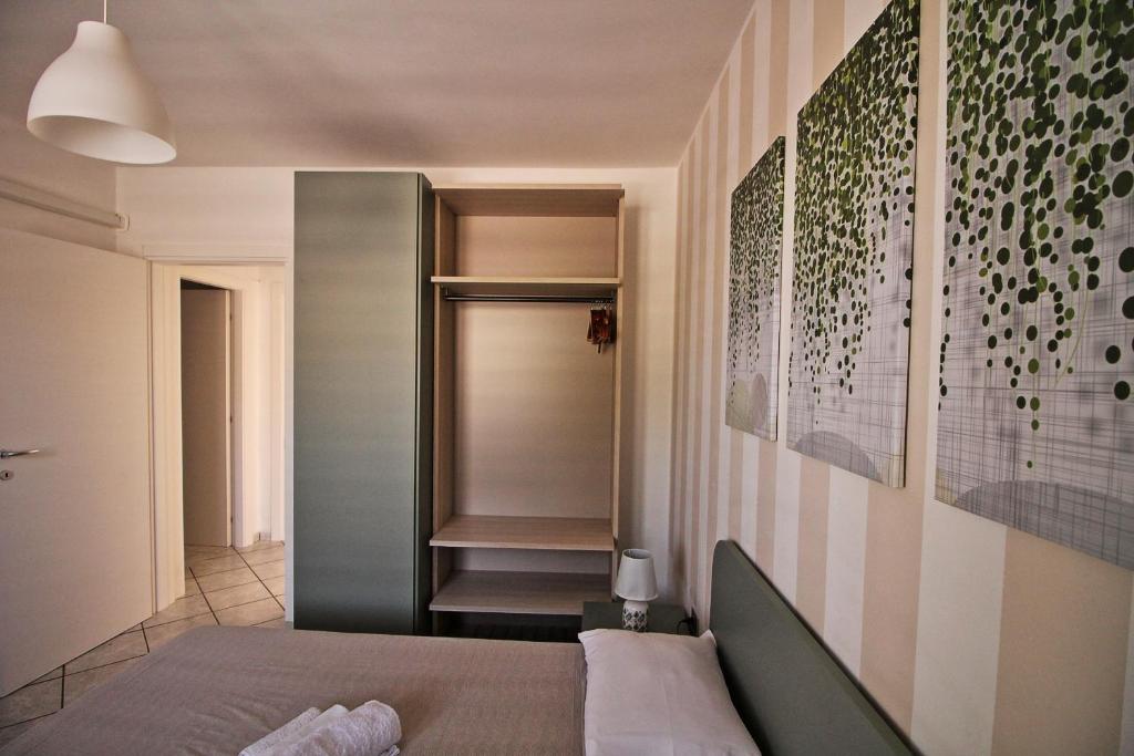 Postel nebo postele na pokoji v ubytování Residence Mare Azzurro