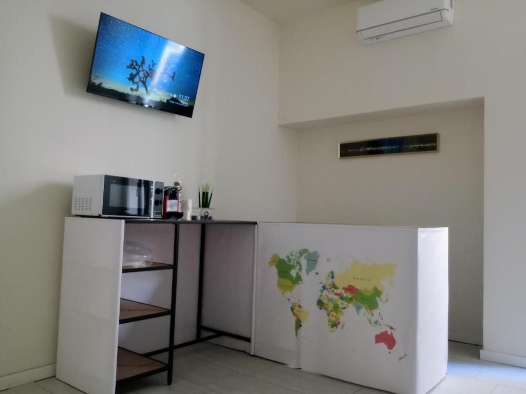 Kuchyň nebo kuchyňský kout v ubytování La Piazza