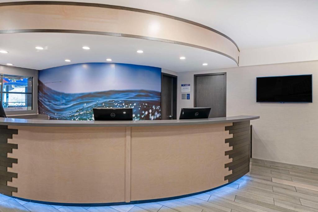 TV a/nebo společenská místnost v ubytování Best Western Plus Sands