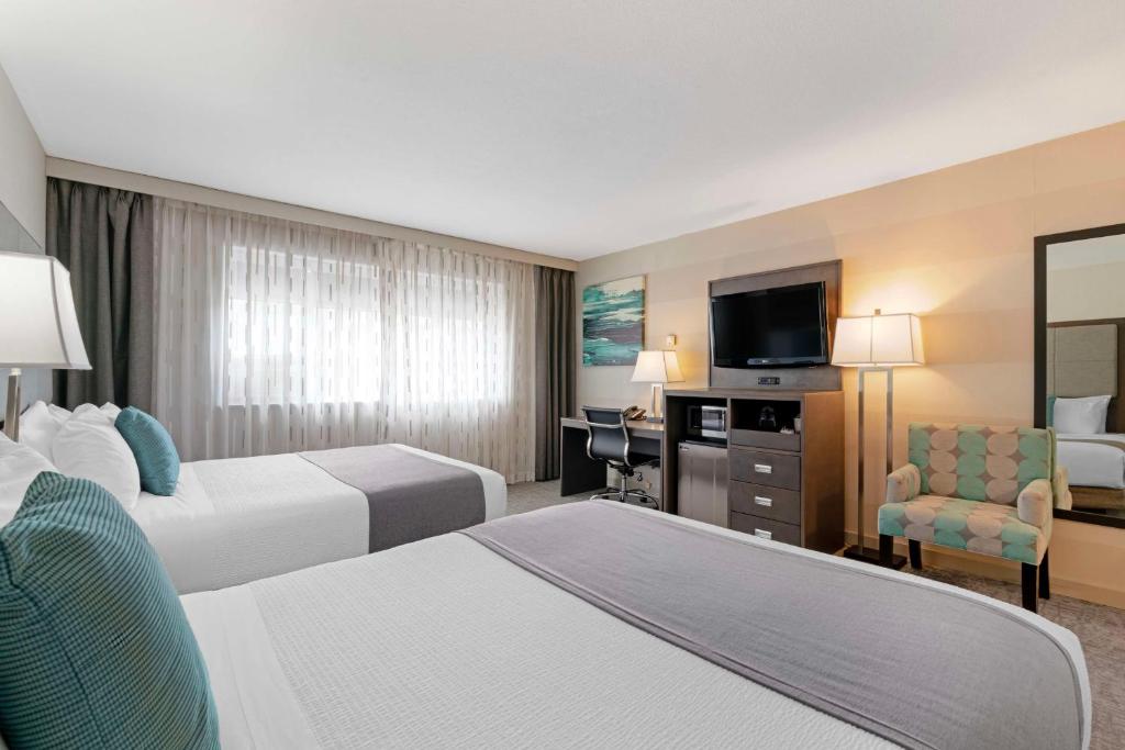 Postel nebo postele na pokoji v ubytování Best Western Plus Sands