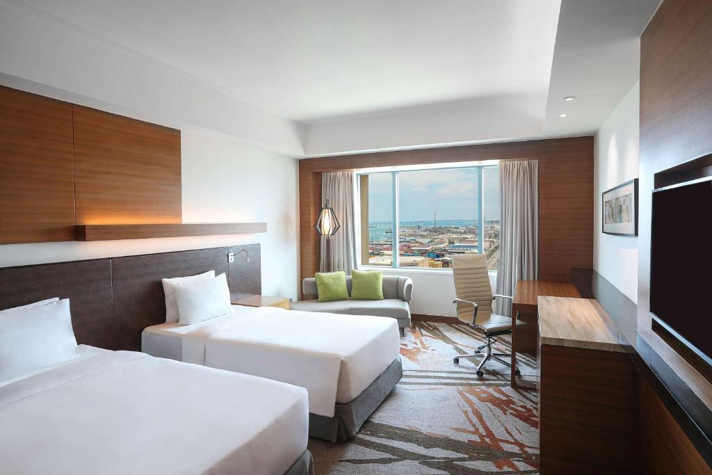Llit o llits en una habitació de Radisson Blu Cebu