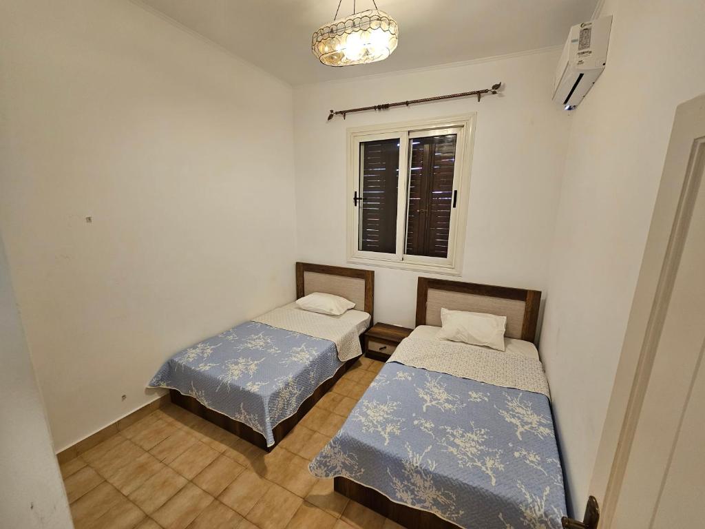 En eller flere senge i et værelse på Cairo