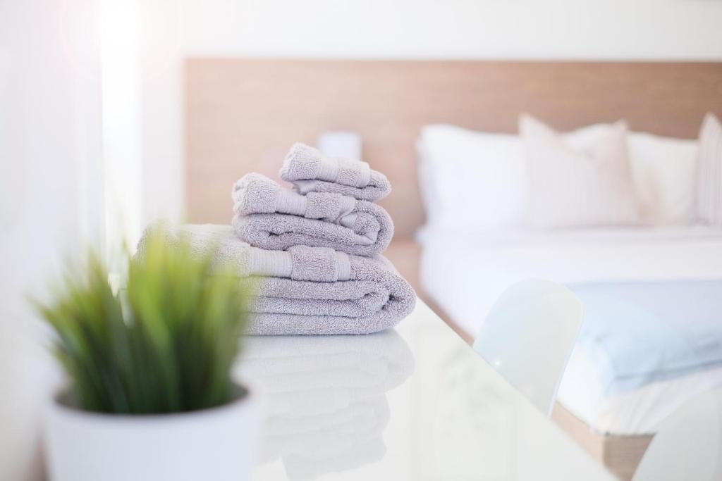 Postel nebo postele na pokoji v ubytování Stay Inn Muskoka