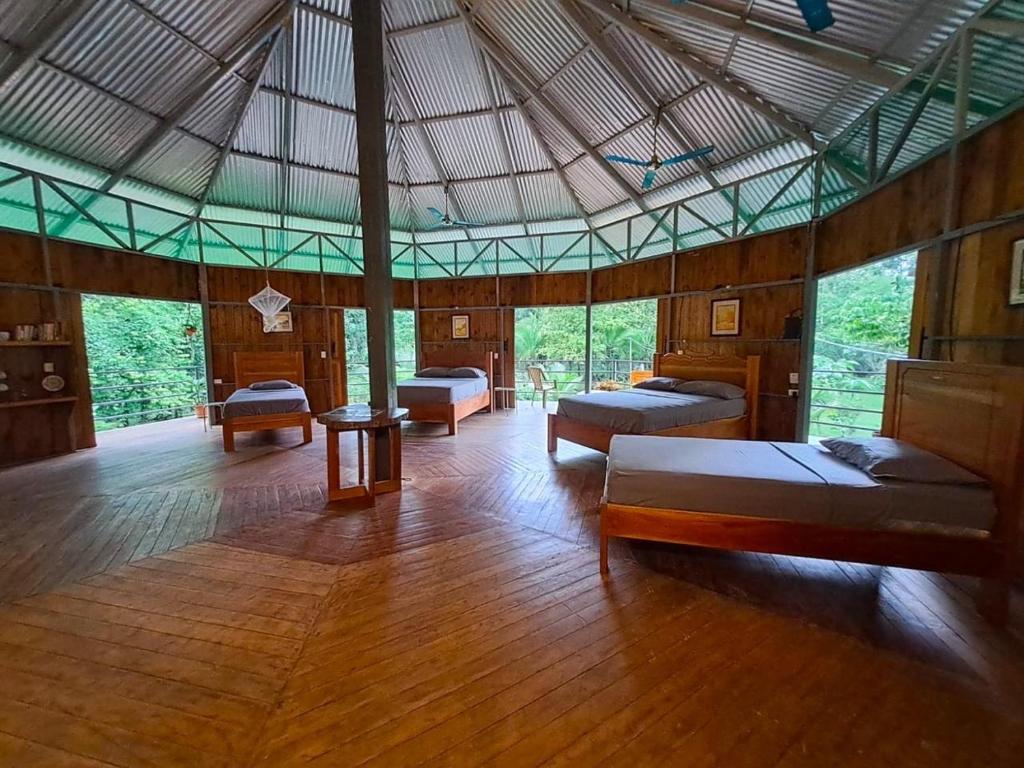 Un ou plusieurs lits dans un hébergement de l'établissement La Amapola Lodge, Bungalow en Península de Osa.